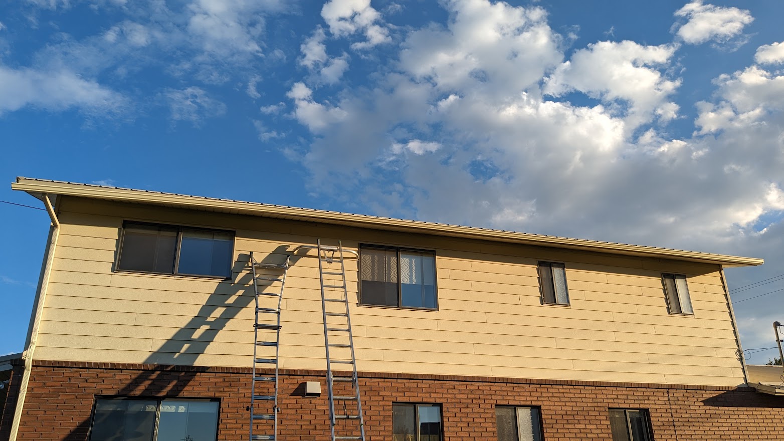 Freshly cleaned gutters on a Northern Utah home in spring